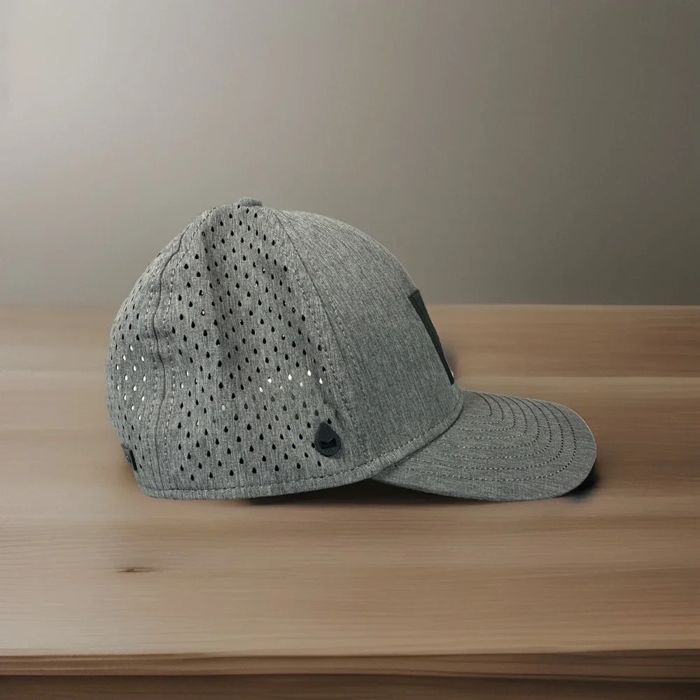 Melin Hydro A-Game Icon Curved Bill Hat, Heather Charcoal, 56 Cm W/ Rubber Patch